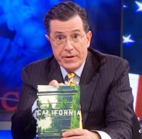 Stephen Colbert displays the book California by Edan Lepucki